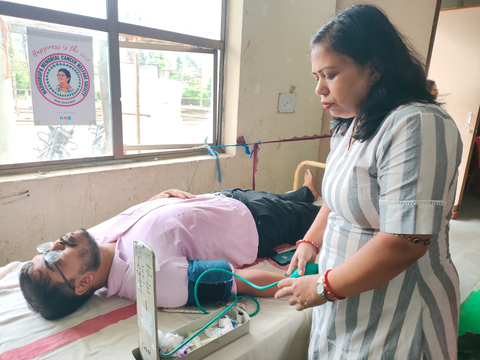 Walking lens (Photography exhibition with help of Streets of Tripura) and Blood donation Camp for Cancer patients - Organized by MMCWS.